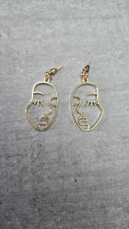 boucles d'oreilles original neuf- doré - visage femme - longue pendante légère