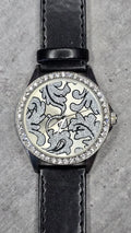 Montre vintage - femme - noir simili cuir - cadran strass argenté motif paillettes - élégant chic