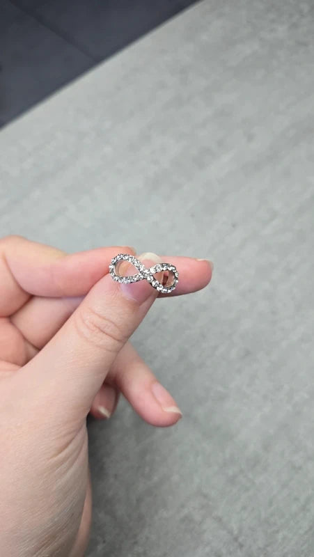 bague neuf - forme infini - strass argenté brillants - chic élégant tendanc