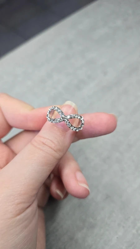 bague neuf - forme infini - strass argenté brillants - chic élégant tendanc