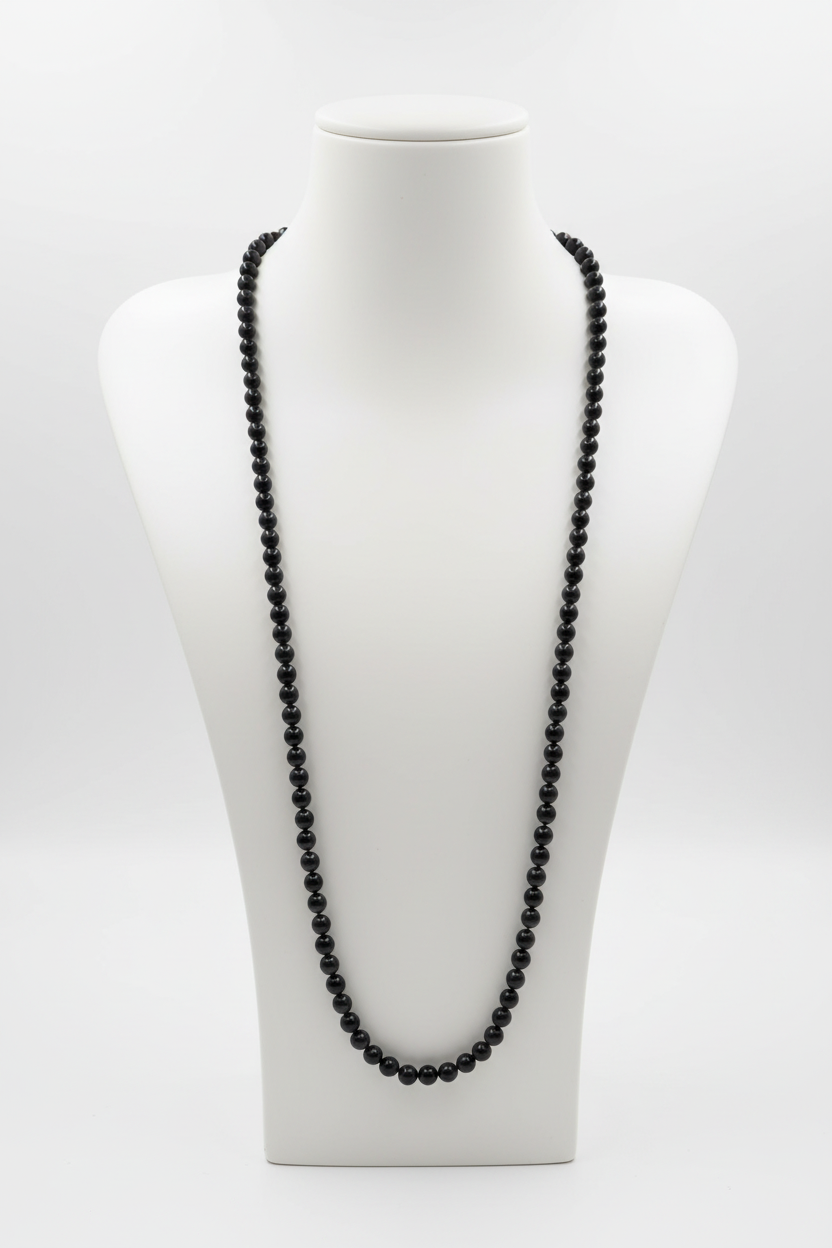 collier long sautoir - perles noir brillantes - minimaliste chic élégant intemporel casual