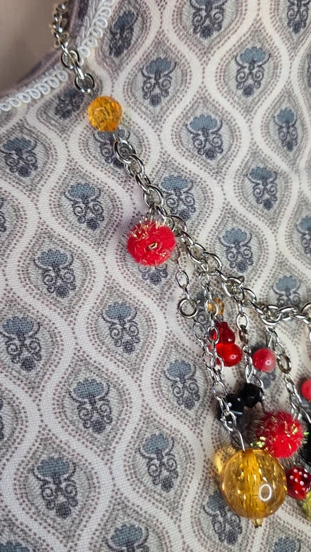 collier plastron - marque Lollipops - neuf - chaine argenté maillon en acier inoxydable - pendentif breloques charms perles facette pompons brillants