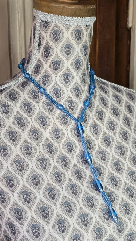 collier vintage sautoir - neuf - effet cravate - perles en verre bleu translucide brillantes - élégante chic - forme y