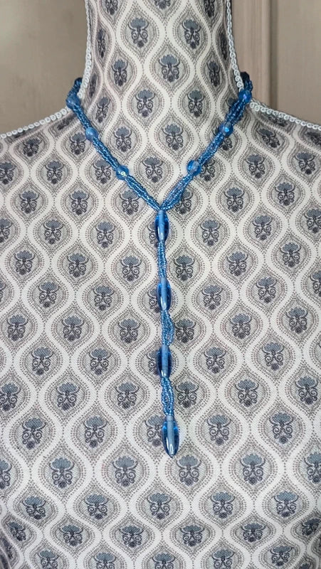 collier vintage sautoir - neuf - effet cravate - perles en verre bleu translucide brillantes - élégante chic - forme y