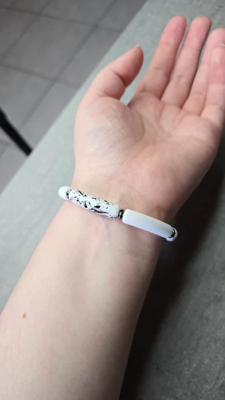 Bracelet - fait main - tube acétate noir blanc dalmatien - pierre naturelle hématite - extensible tendance