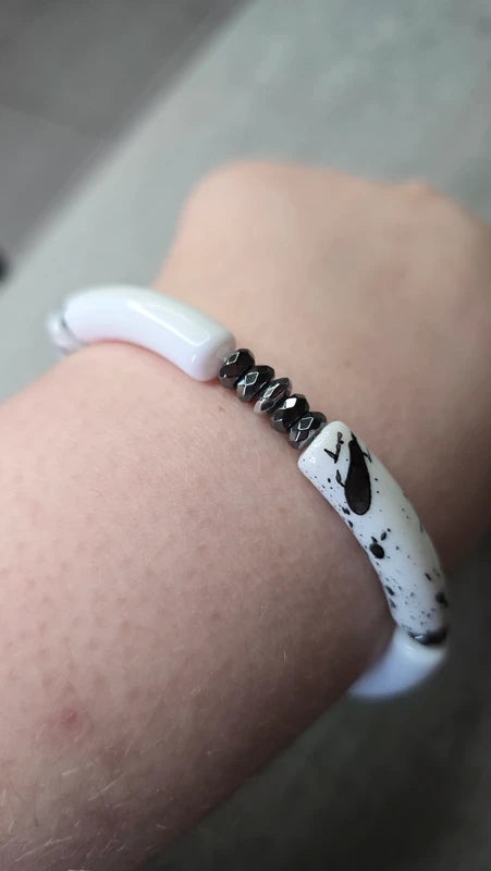 Bracelet - fait main - tube acétate noir blanc dalmatien - pierre naturelle hématite - extensible tendance