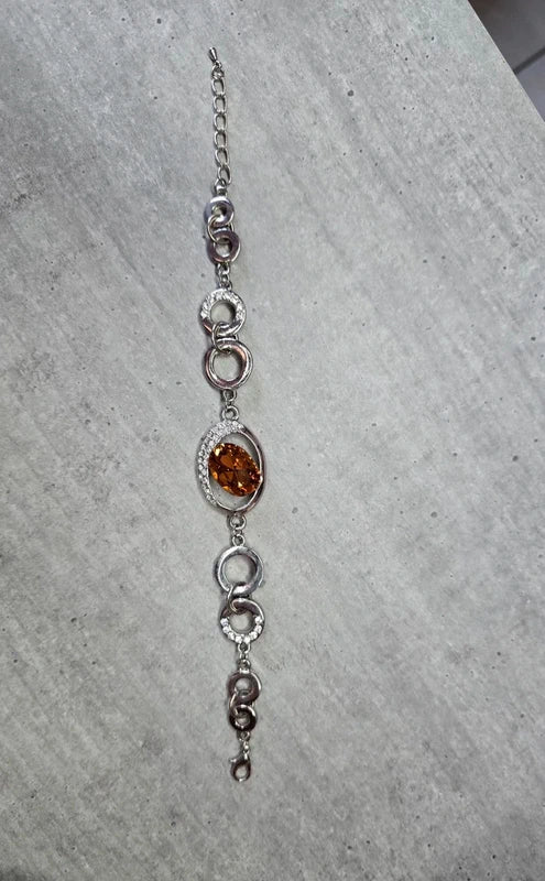 bracelet vintage - neuf - pierre facette effet ambre orange - strass argenté - cercle brillant - chic élégant - acier inoxydable