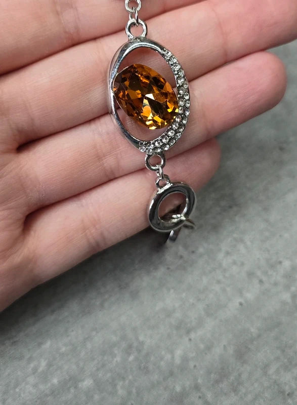 bracelet vintage - neuf - pierre facette effet ambre orange - strass argenté - cercle brillant - chic élégant - acier inoxydable