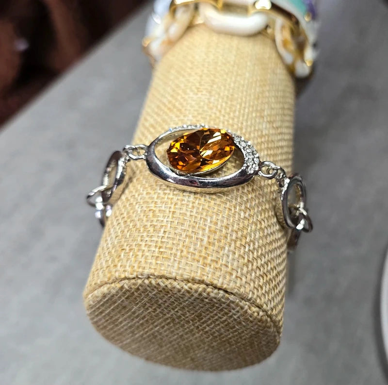 bracelet vintage - neuf - pierre facette effet ambre orange - strass argenté - cercle brillant - chic élégant - acier inoxydable