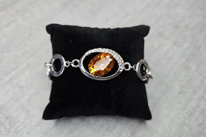 bracelet vintage - neuf - pierre facette effet ambre orange - strass argenté - cercle brillant - chic élégant - acier inoxydable