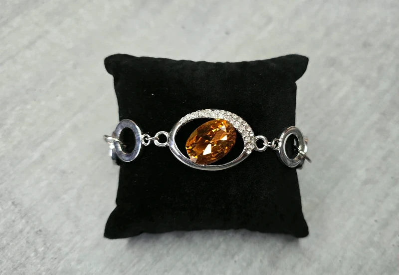bracelet vintage - neuf - pierre facette effet ambre orange - strass argenté - cercle brillant - chic élégant - acier inoxydable
