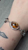 bracelet vintage - neuf - pierre facette effet ambre orange - strass argenté - cercle brillant - chic élégant - acier inoxydable