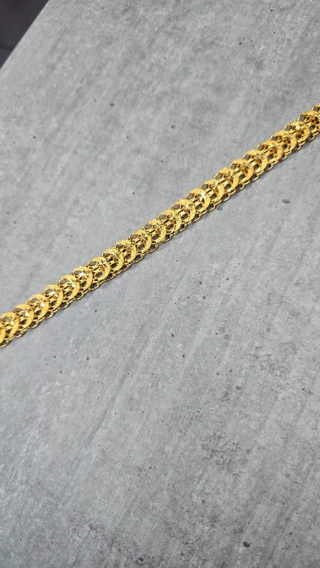 bracelet vintage - neuf - effet gourmette - acier inoxydable doré - motif ajouré travaillé maille - style rétro - chic