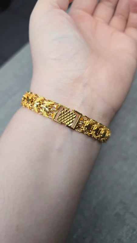 bracelet vintage - neuf - effet gourmette - acier inoxydable doré - motif ajouré travaillé maille - style rétro - chic