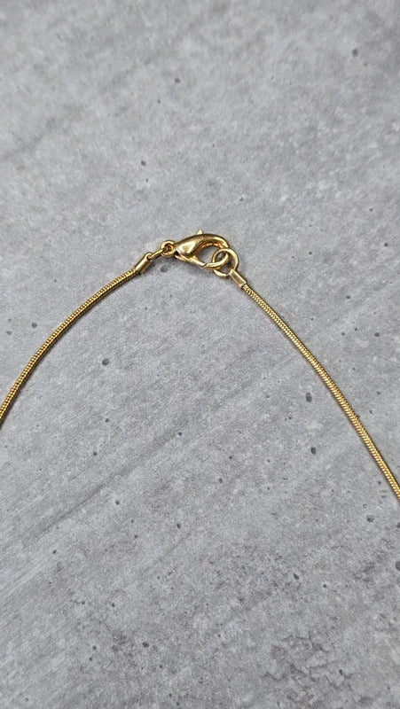 collier vintage chic - neuf - acier inoxydable - chaine doré pendentif noeud serpent pierre rose strass argenté - élégant