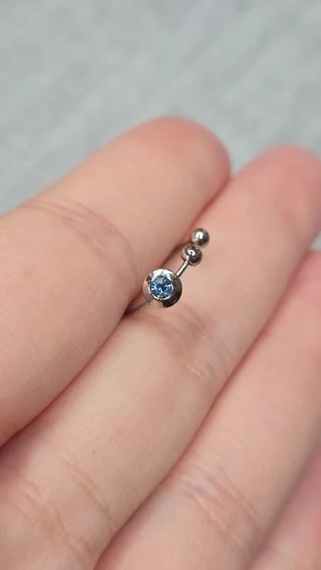 faux piercing - neuf sous blister - acier inoxydable - couleur argenté strass bleu brillant lumineux ajustable - nez oreille