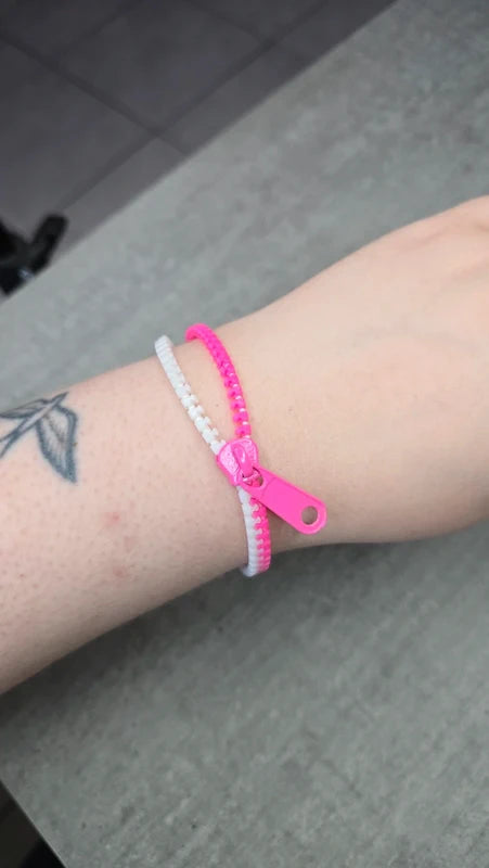 bracelet vintage - neuf - fermeture éclair véritable ouvrant - argenté gris clair ou blanc rose - original rare Y2K fun