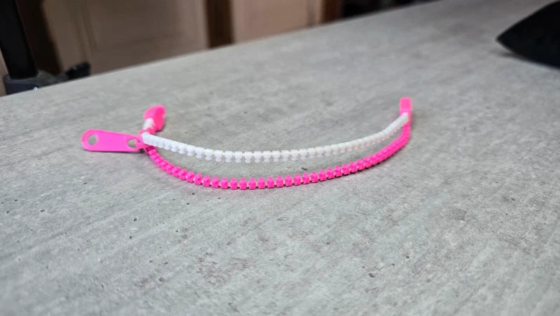 bracelet vintage - neuf - fermeture éclair véritable ouvrant - argenté gris clair ou blanc rose - original rare Y2K fun