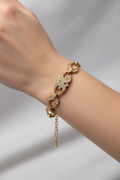bracelet vintage - neuf - maillon doré - pierre strass argenté - élégant chic